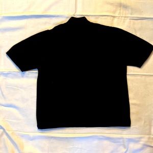 100% Extra Fine Merino Wool. Black Size XL
